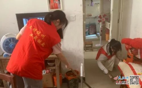 鄱阳县饶州街道五一路社区开展 关爱 小贝壳 温情在社区 志愿服务残障人士活动 图
